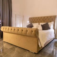 PALAZZO NOVECENTO Centro Storico Rooms & Wellness