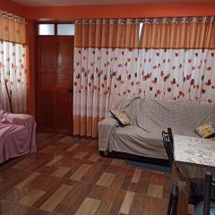 A mini apartment with a kitchen- casa de Eva