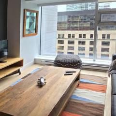 Pet-Friendly Furnished 1B Rental in Montreal with Skyline Views & Concierge
