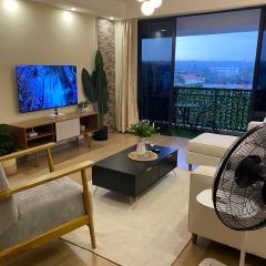 urban loft retreat apartment with fully equipped gym ,heated swimming pool, private parking and relaxing rooftop with breath taking views