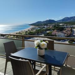 Apartamento con terraza, vistas playa y montaña