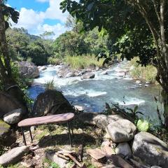 Rustic two bedroom house right by the Chirripo river