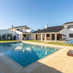 Stunning Poolside Home with Terrace by HostWise