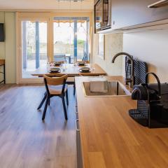 Surfers Oase near Interlaken at lake with pool