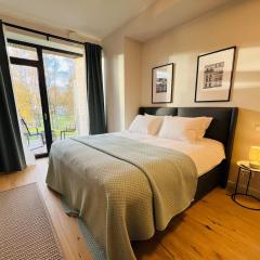 Sunny apartment with a balcony by the sea