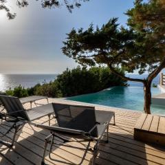 Villa Nettuno panoramic pool villa with patio above the sea