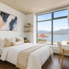 Rare Panorama North Shore Mountains Harbour from this 2-Bedroom