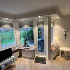 Strandkoenig-Westerland-Terrasse-mit-Garten-Strandnaehe-PKW-Stellplatz