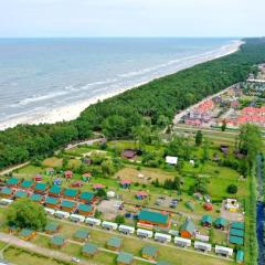 Single-story houses with terraces close to the sea