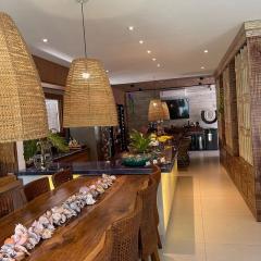 Casa nova em condominio com 4 suites spa e academia