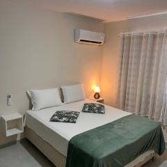 Refúgio Aconchegante à 6 min da Praia com Ar Condiconado - Wi-Fi