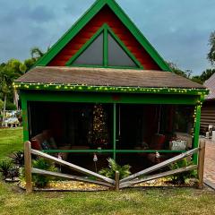 Gingerbread Cozy Log Cabin with Beautiful Sunsets
