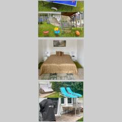 Gemütliche 2 Zimmer Ferienwohnung mit Terrasse Fernsehsessel Spülmaschine Grill Schaukel, fußläufig zu S-Bahn nach München und See, ideal zum Entspannen aber auch zum Arbeiten