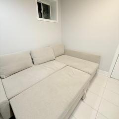 Studio Basement Suite with Sofa Bed and kitchen, Entrance from Garage -Sleeps 2
