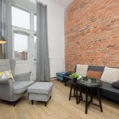 Stylish Apartment with Mezzanine, next to Metro Station by Noclegi Renters