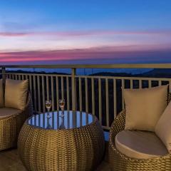 SaffronStays Hillside Harrier - Swiss-style cottages in Lonavala with balconies, bathtubs, and bonfire setup