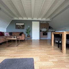 Heggenmus I Huisje met Haard in de Tuin