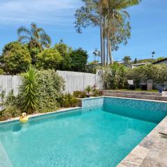 Sunlit Pool Your Holiday Centrepiece