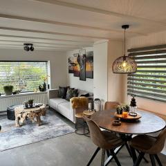 Casa Dekker on natural swimming water with private jetty