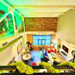 Festive Grinchmas Getaway Downtown At The Loft!