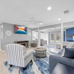 Updated Waterfront Pool Home with Putting Green