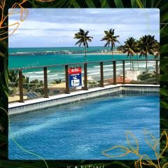 Flat com varanda e VISTA PARA O MAR em Porto de Galinhas a 50 metros da areia- Com opção de café da manhã e próximo ao Centro