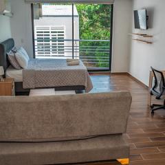 Modern studio apartment with AC and secure parking