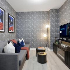 Modern Townhouse Luxe Walk-In Closet- 65 TV