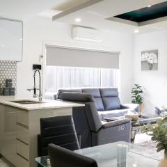 Modern 4BR Near Shops, Airport & Walking Trail