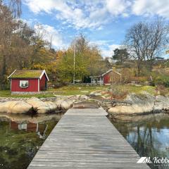 Dog-friendly cottage with boat & private jetty at Tjörn SE09170
