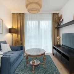 Modern Apartment with Garden and Parking in Gdańsk by Noclegi Renters