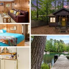 Riverview – Torch Waterfront Cabin with Dock Firepit Near Torch Lake Sandbar ➠ 14047