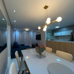 Apto novo, 2 quartos, quadra praia em Santos.