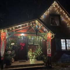 Dom Zielarki z widokiem na jezioro, sauna, balia