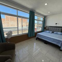 Moderno y Céntrico Loft con Vista a la Ciudad