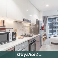 StayShort - Azizi Riviera 38 studio with a serene pool view