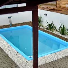 Casa com piscina praia