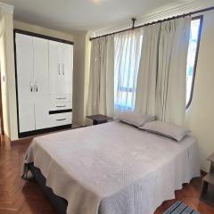 Casa con jardín privado