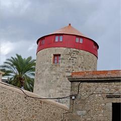 A medieval windmill tower in the heart of old town with magnificent view