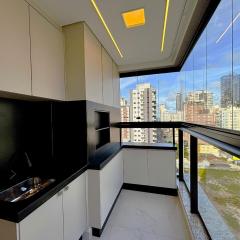 Apto c/ varanda gourmet a 700m da Praia BON1101