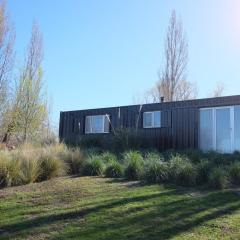 Container on the banks of the River