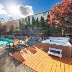 Stylish 4BR retreat with pool & year-round hot tub