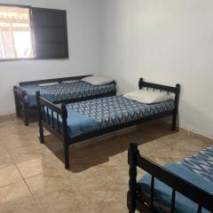 Quarto privativo em casa de praia próxima a cachoeira