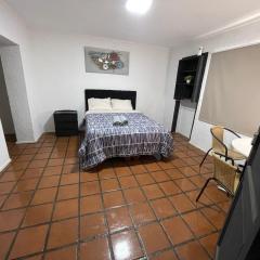 Habitación doble superior en el centro, con baño