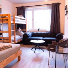 New central 3 room apartment with parking near train station & casino