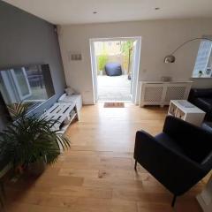 Spacious 3-Bed Home with Private Gym & Garden