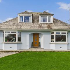 Wyvern – Beautiful & Spacious 4-Bedroom Home with Parking & Gardens