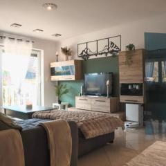 Familienwohnung mit Whirlpool Badewanne und Balkon