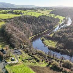 Riverside house with spectacular views