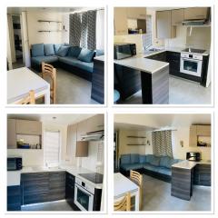 Mobil home de standing à la Porte des Cévennes sur un terrain arboré et ombragé